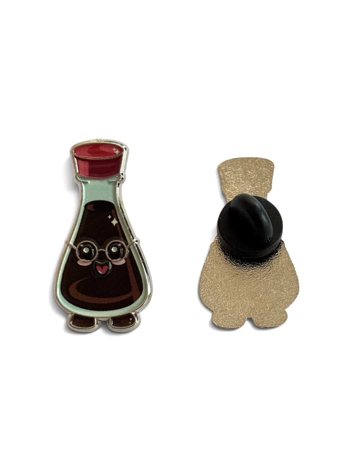 Enamel pins shaped like a smart soy bottle character, shown on a plain white background. One pin is the front view with a red cap, dark brown body, and light outline; the other shows the back and pin cap.