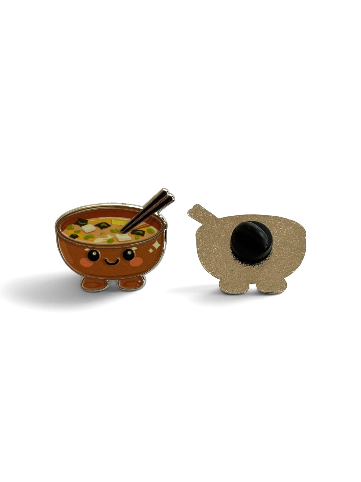 Two cute enamel pins on a white background: bowl of patient ramen soup with chopsticks, backside shows a black circular pin cover.